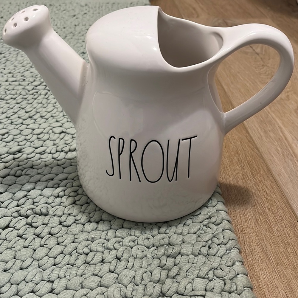Sprout water can decor